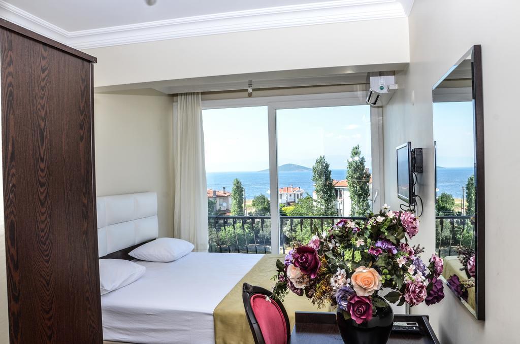 Uzunhan Hotel Айвалык Номер фото