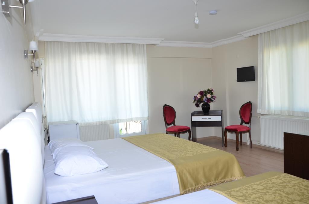 Uzunhan Hotel Айвалык Номер фото