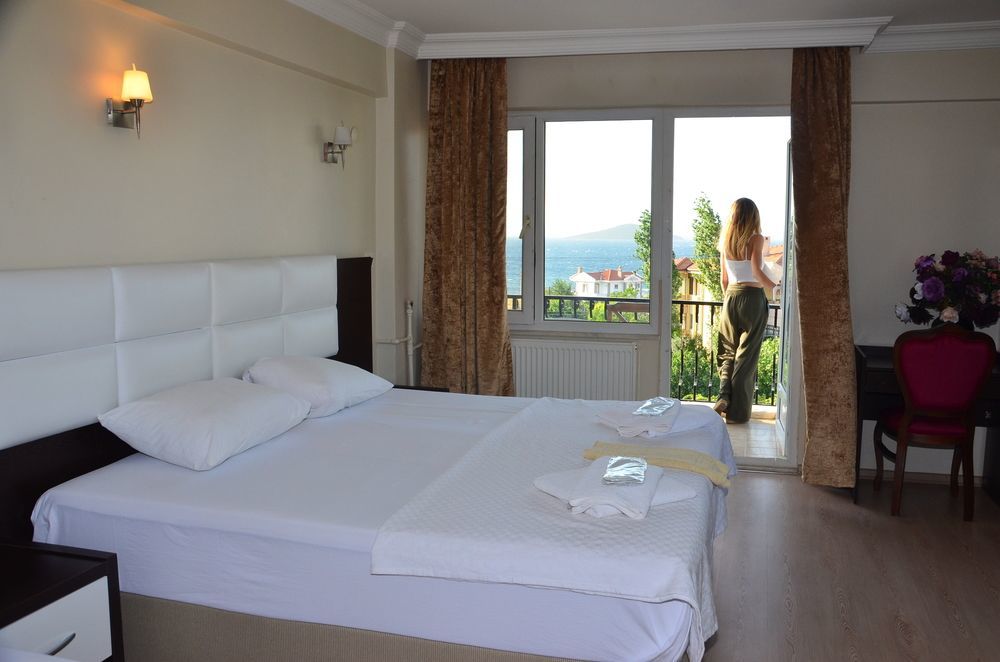Uzunhan Hotel Айвалык Экстерьер фото
